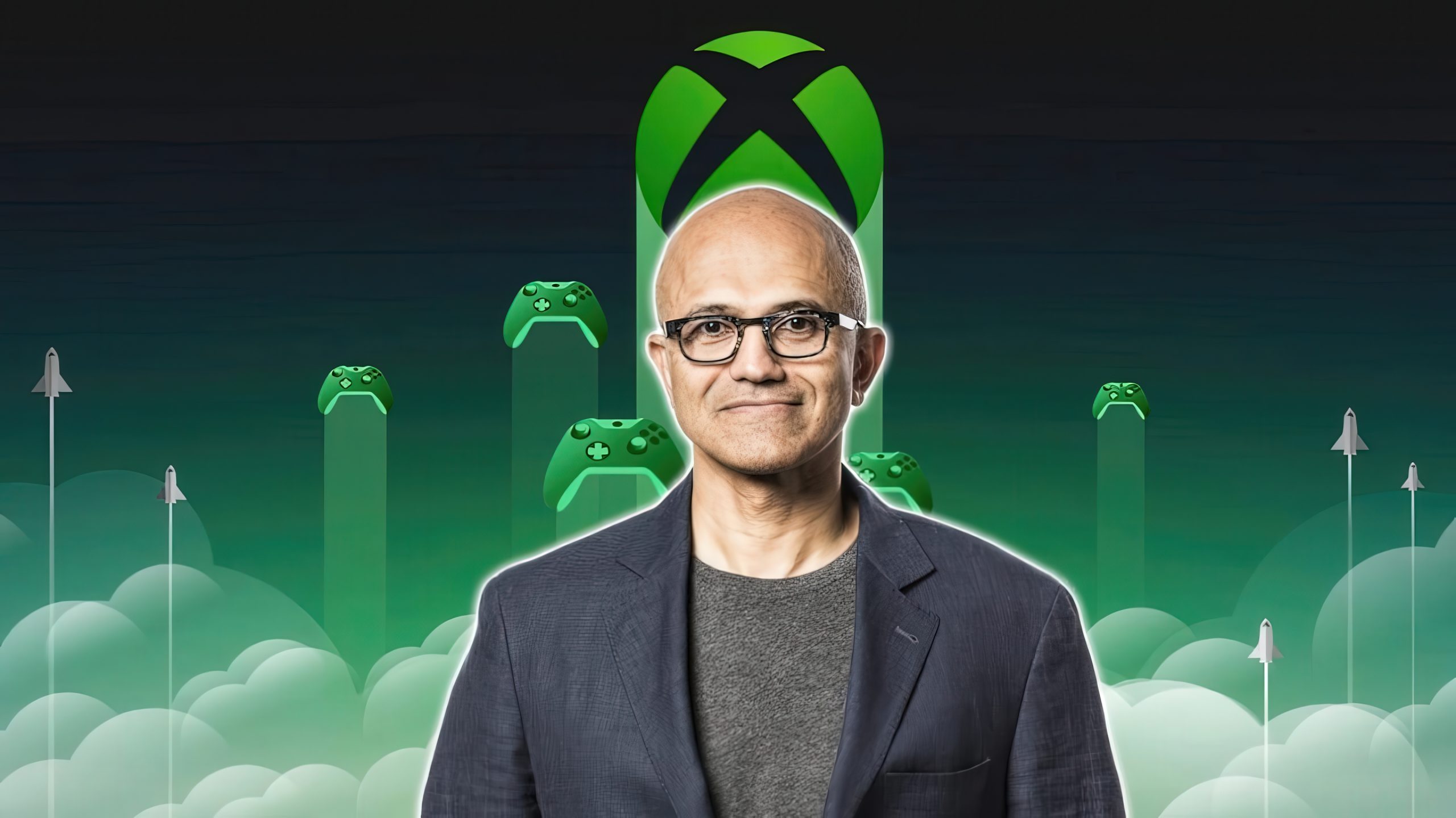 Satya Nadella đứng trước biểu tượng Xbox và các tay cầm chơi game