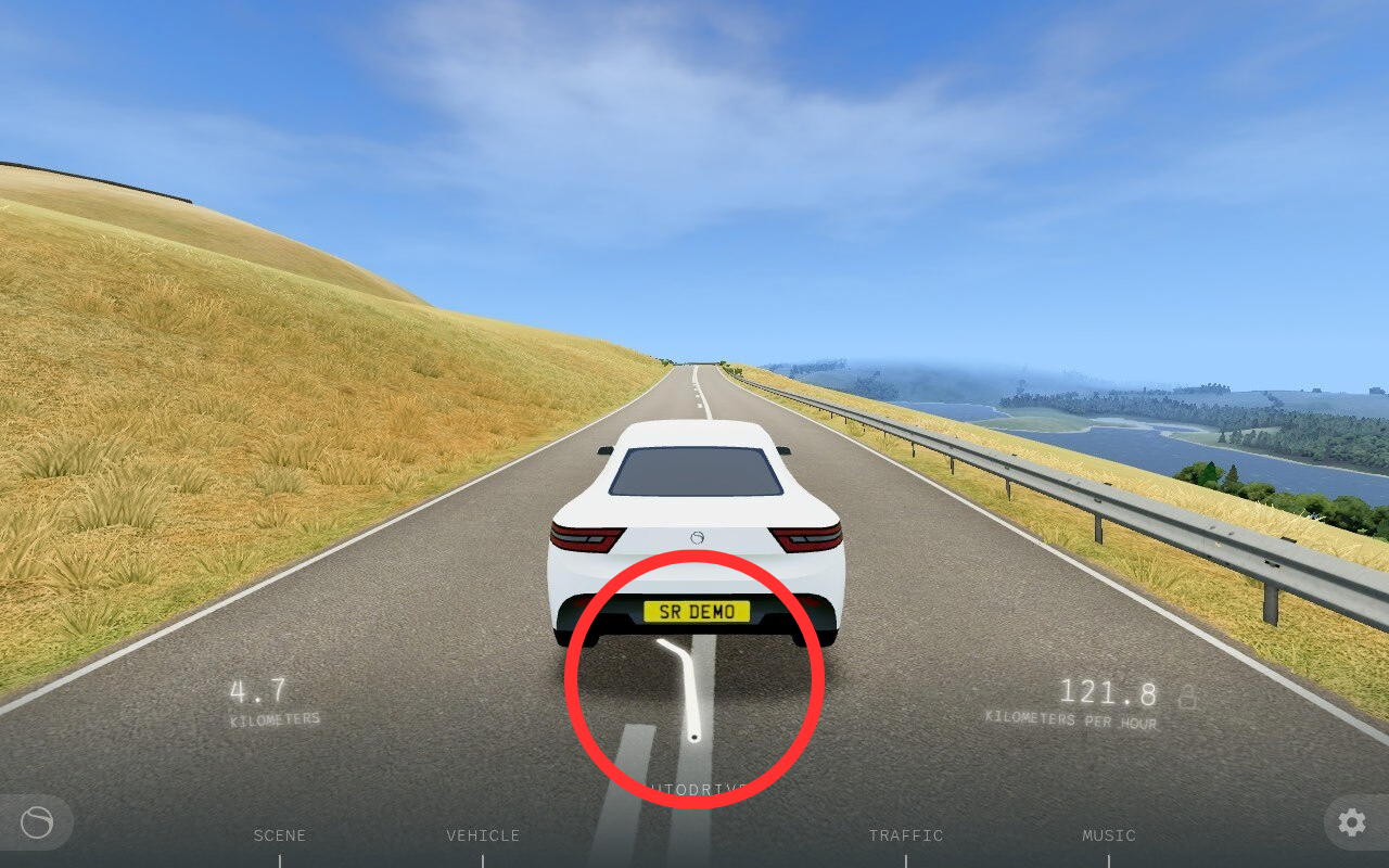 Đường cong chỉ hướng được khoanh đỏ bên dưới xe trong Slow Roads