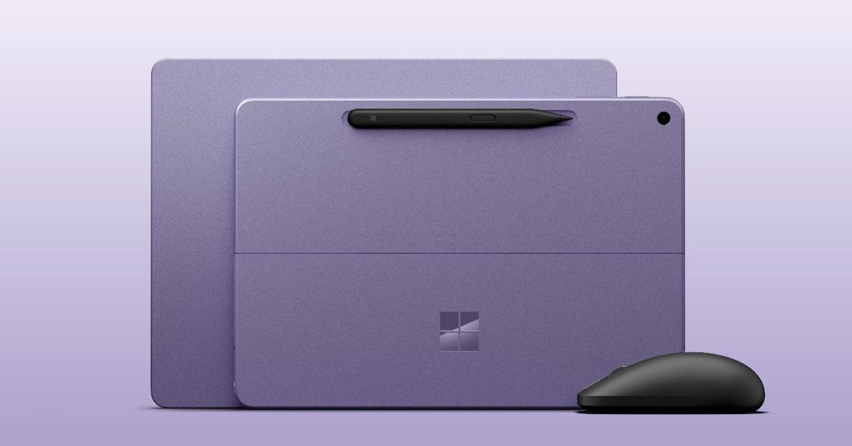 Hai thiết bị Surface màu tím cùng bút và chuột