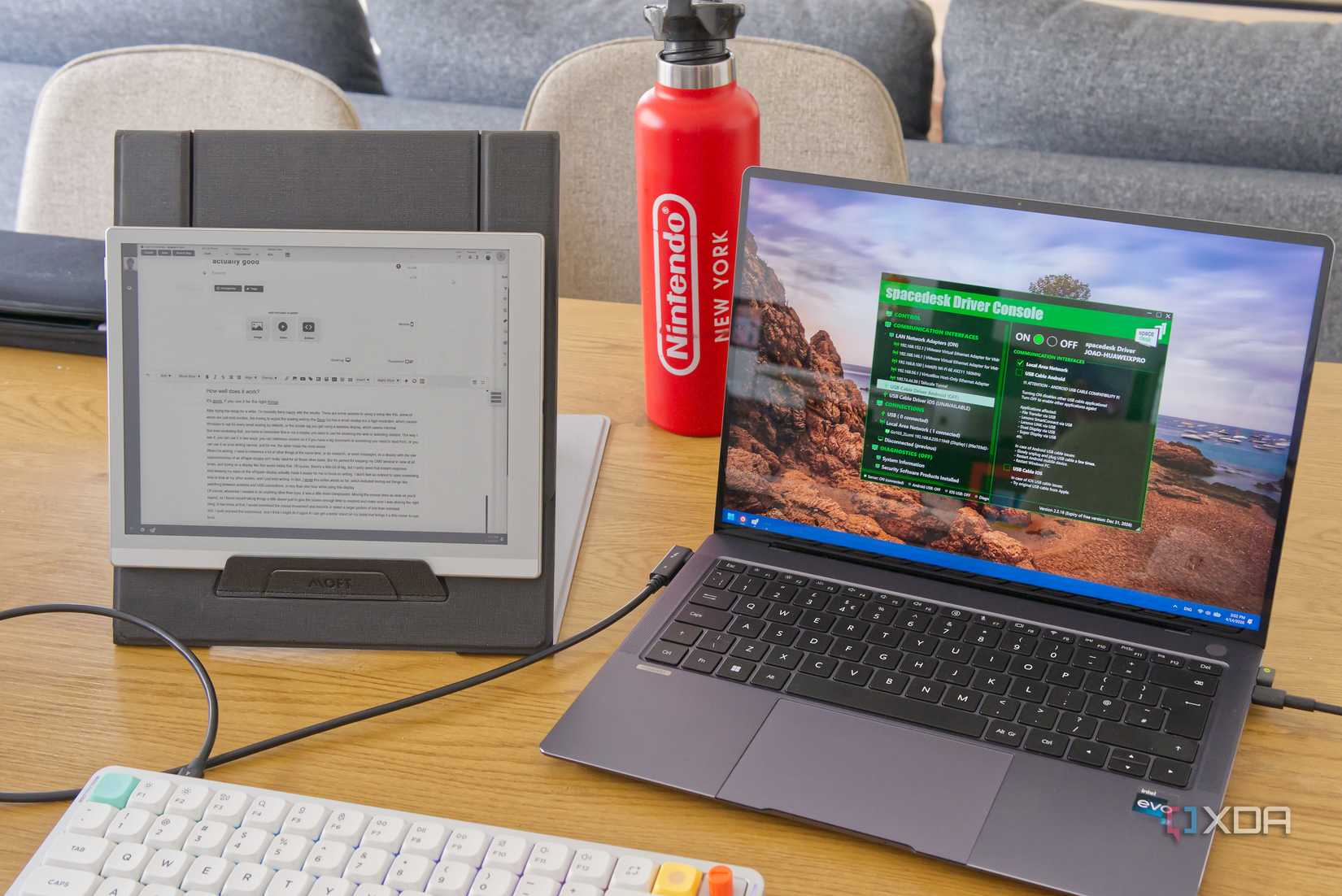 A laptop next to a Boox Gop 10.3 ePaper tablet being used as a second monitor