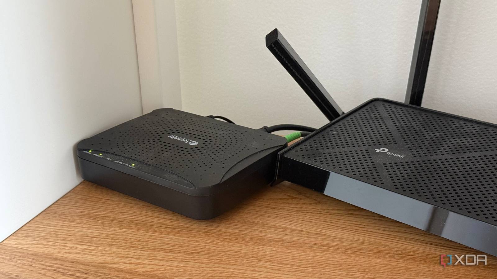 A photo of a router and modem next to one another