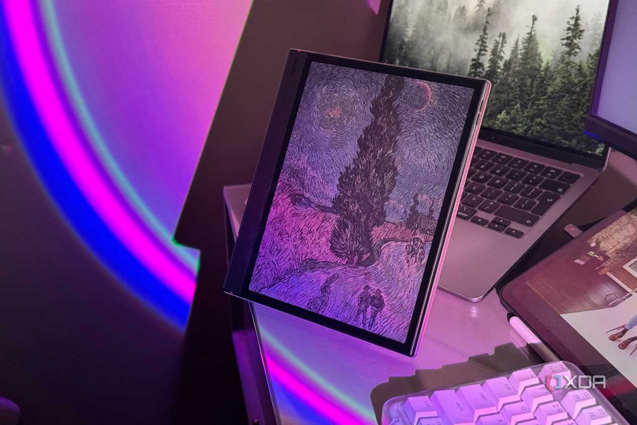 Boox tablet showing a Van Gogh painting in color, lit by a pink and blue light arc