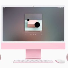 Cặp loa HomePod mini 2 màu hồng đặt cạnh iMac
