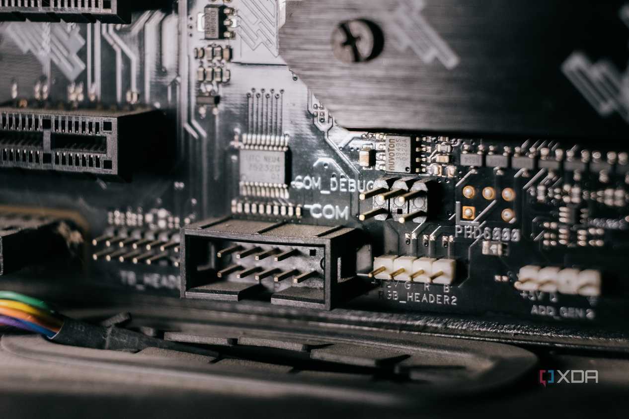 Close-up of a motherboard showing a serial port header