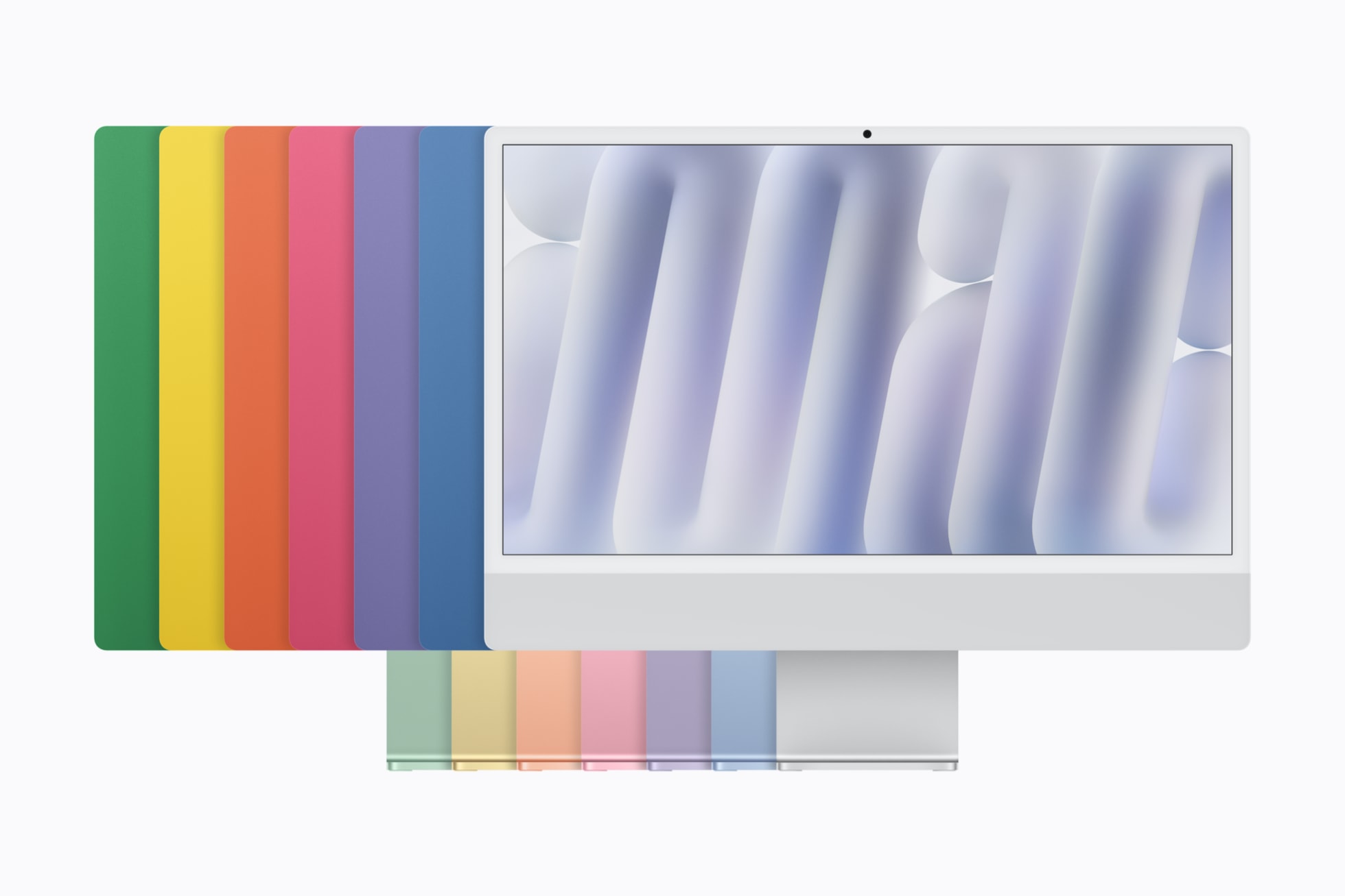 Dải màu iMac xếp sau một máy màu bạc nhìn từ phía trước