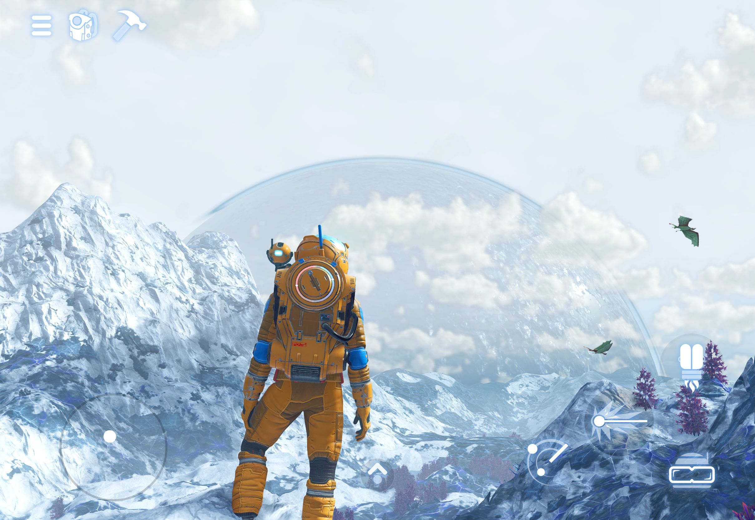 Màn hình iPad hiển thị nhân vật đứng trước căn cứ và địa hình đồi núi trong No Man’s Sky