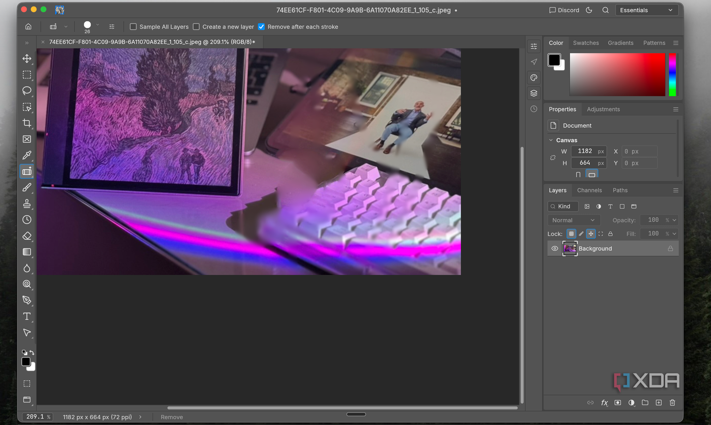 PhotoCraft Remove tool erasing part of a keyboard in the zoomed-in desk photo