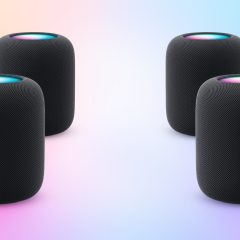 Render bốn loa HomePod xếp thành cặp trước và sau trong một căn phòng.
