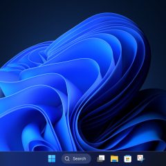 Thanh tác vụ Windows 11 với nút Start và ô Search trên nền xanh
