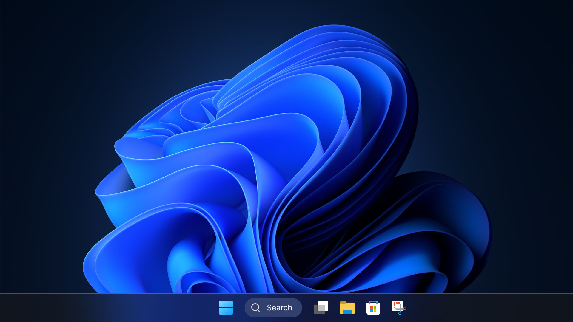 Thanh tác vụ Windows 11 với nút Start và ô Search trên nền xanh